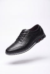 Men's Sneakers Quilted Low Top in Black — primary packshot