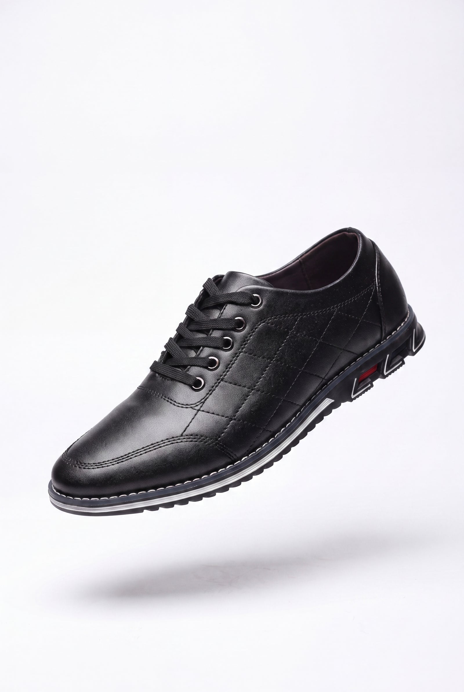 Men's Sneakers Quilted Low Top in Black — primary packshot