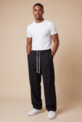 Men's Trousers Wide Leg Drawstring in Black — studio front