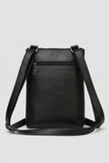 Pebbled Faux Leather Crossbody Bag in Black — studio angle