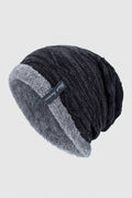 Plush-Lined Slouchy Beanie in Black — studio front