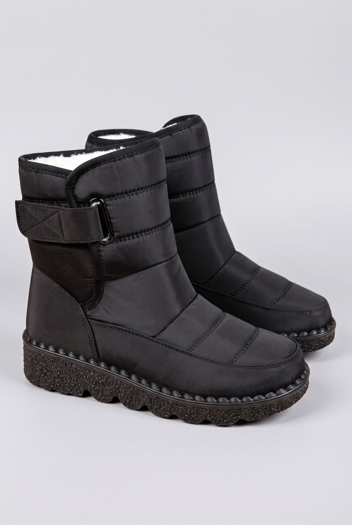 Quilted Ankle Snow Boots in Black — studio front