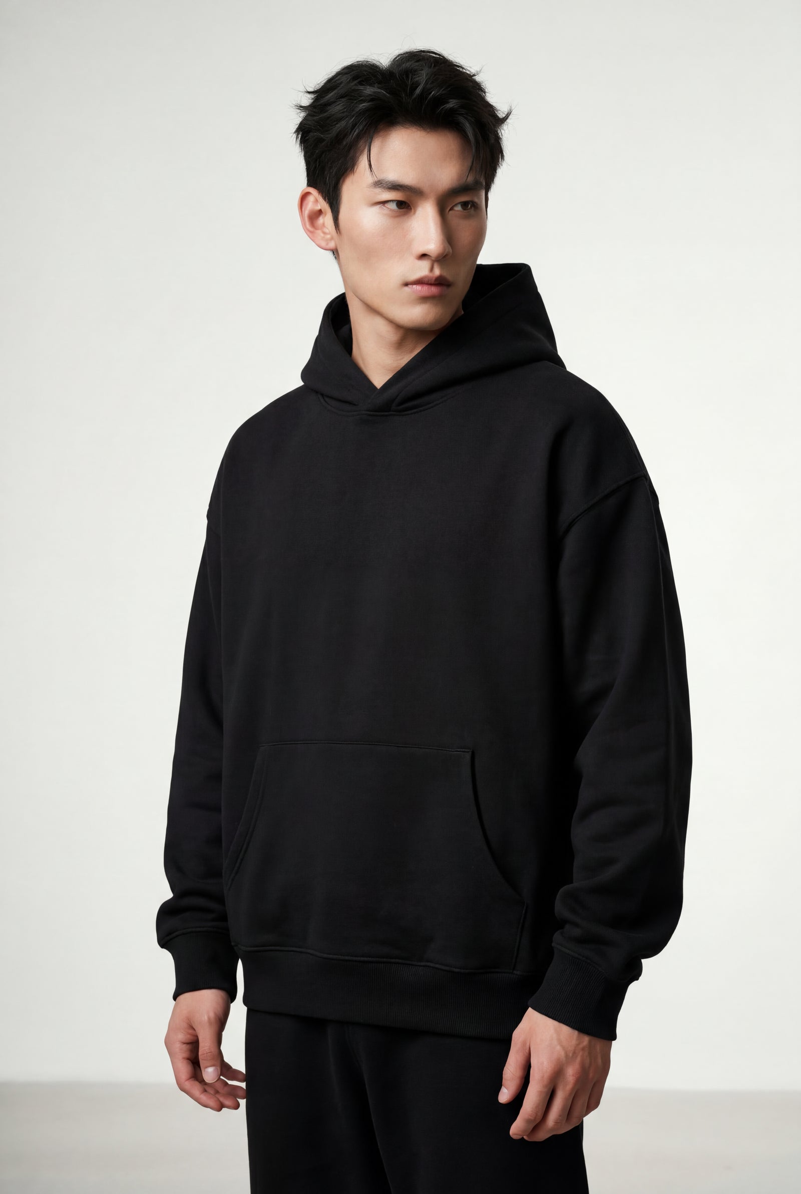 Black Relaxed Fit Pullover Hoodie with Kangaroo Pocket - Hoodies - Photo 4