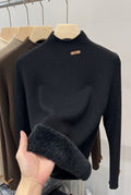 Ribbed High-Neck Sweater in Black — studio front