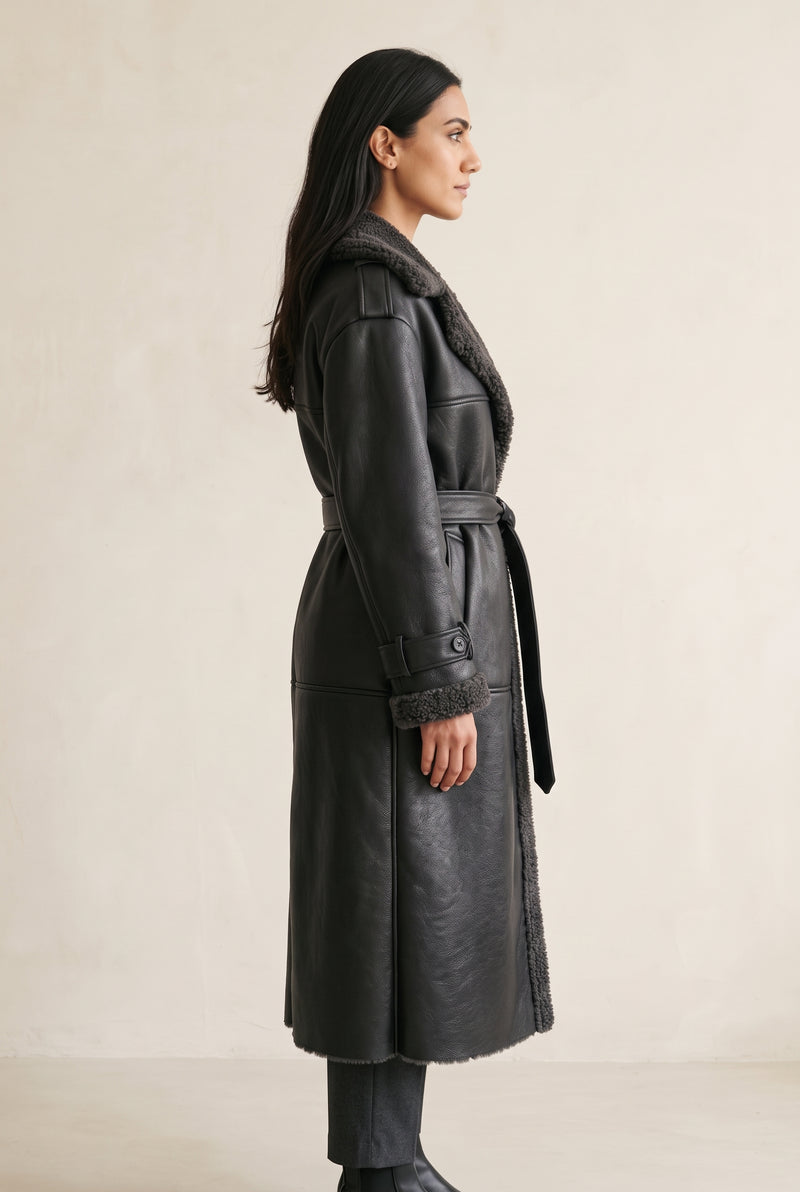 Teddy-Trim Belted Coat in Black — studio angle