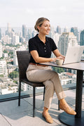 Women's Polo Shirt Elegant Fit in Black — lifestyle business terrace