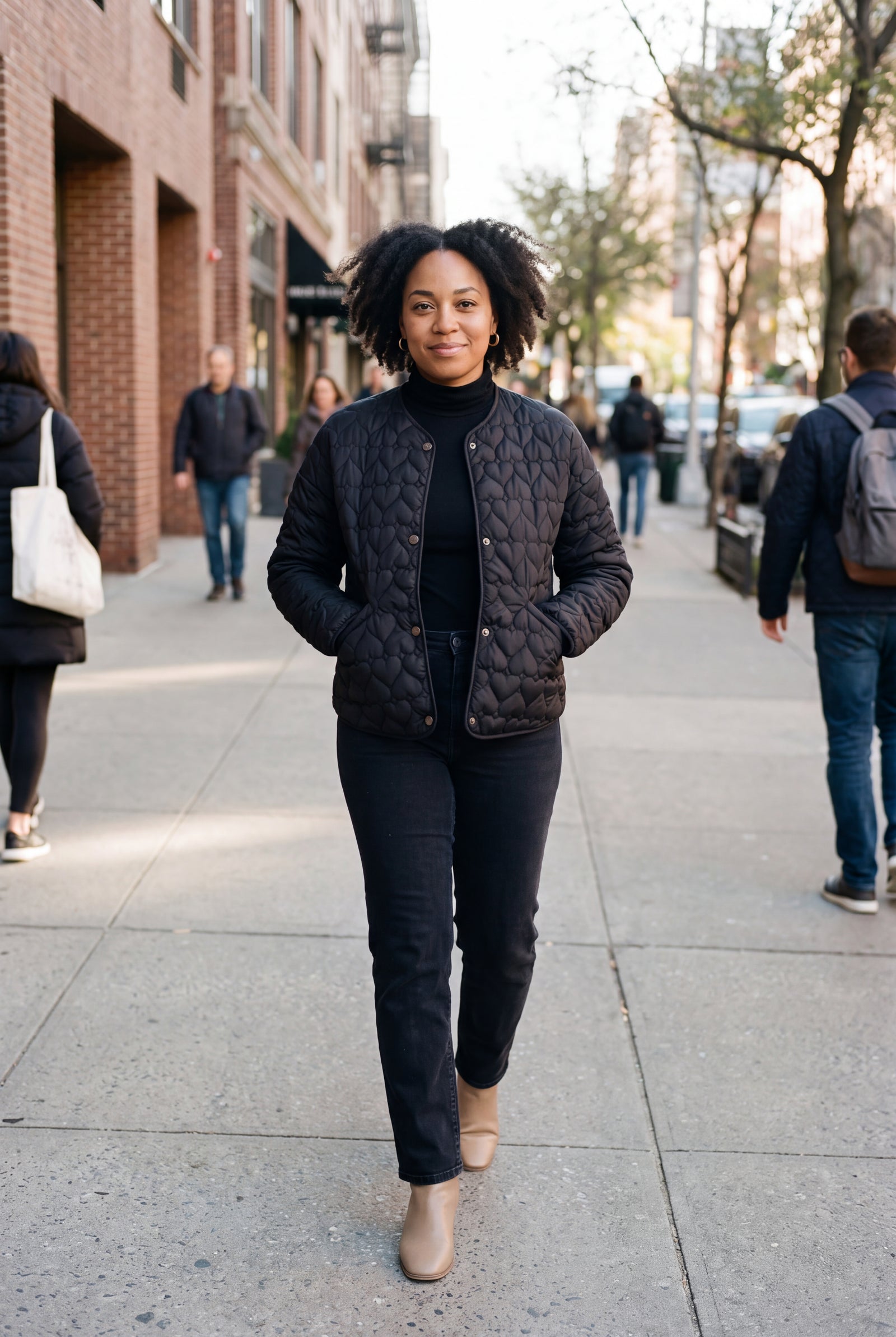 Women's Puffer Jacket Heart Quilted in Black — lifestyle sidewalk