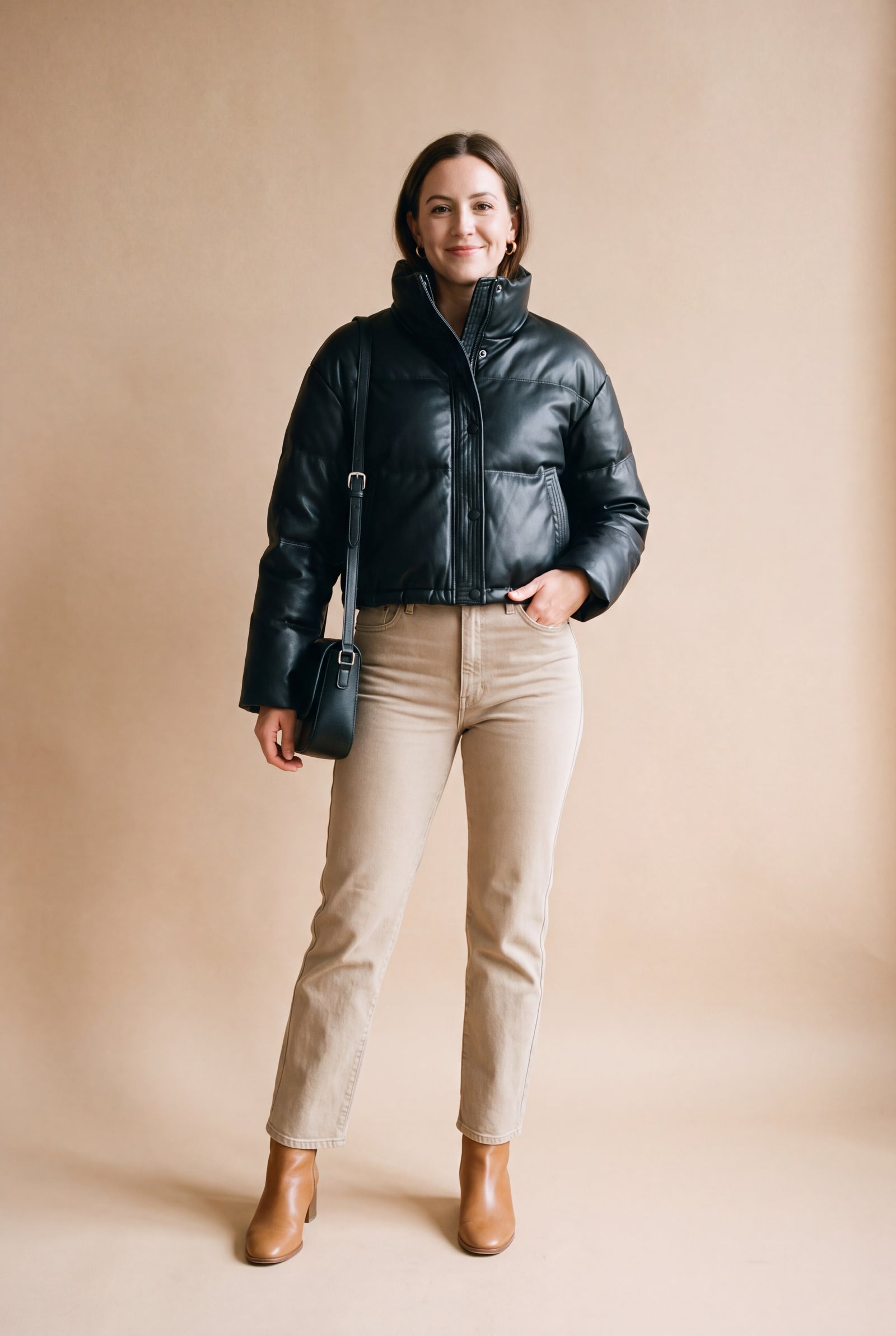 Women's Puffer Jacket High Collar Cropped in Black — studio look
