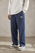 Corduroy Trousers with Drawstring in Blue — studio front