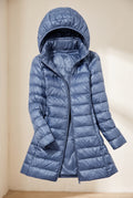 Glossy Hooded Puffer Coat in Blue — studio front
