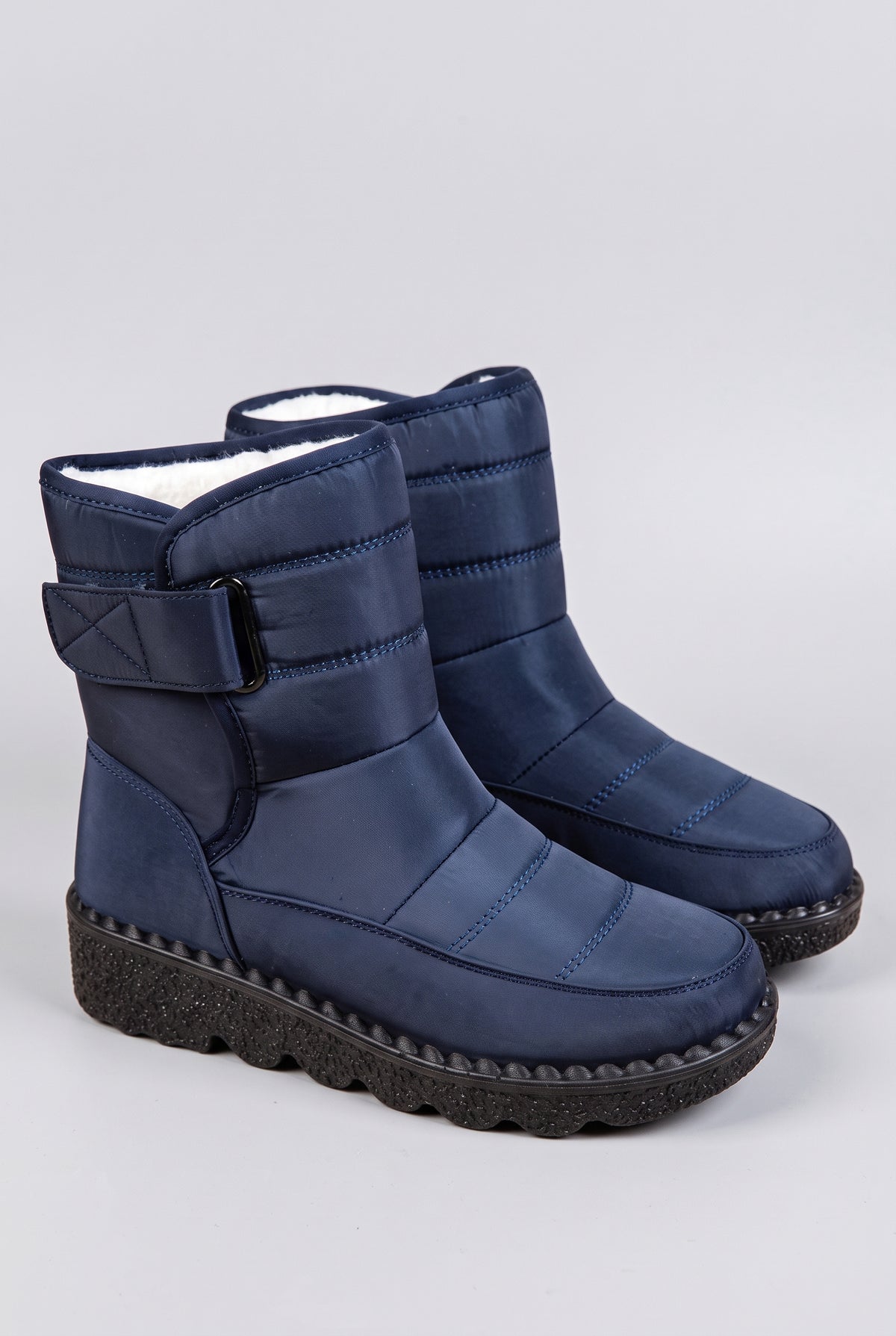 Quilted Ankle Snow Boots in Blue — studio front