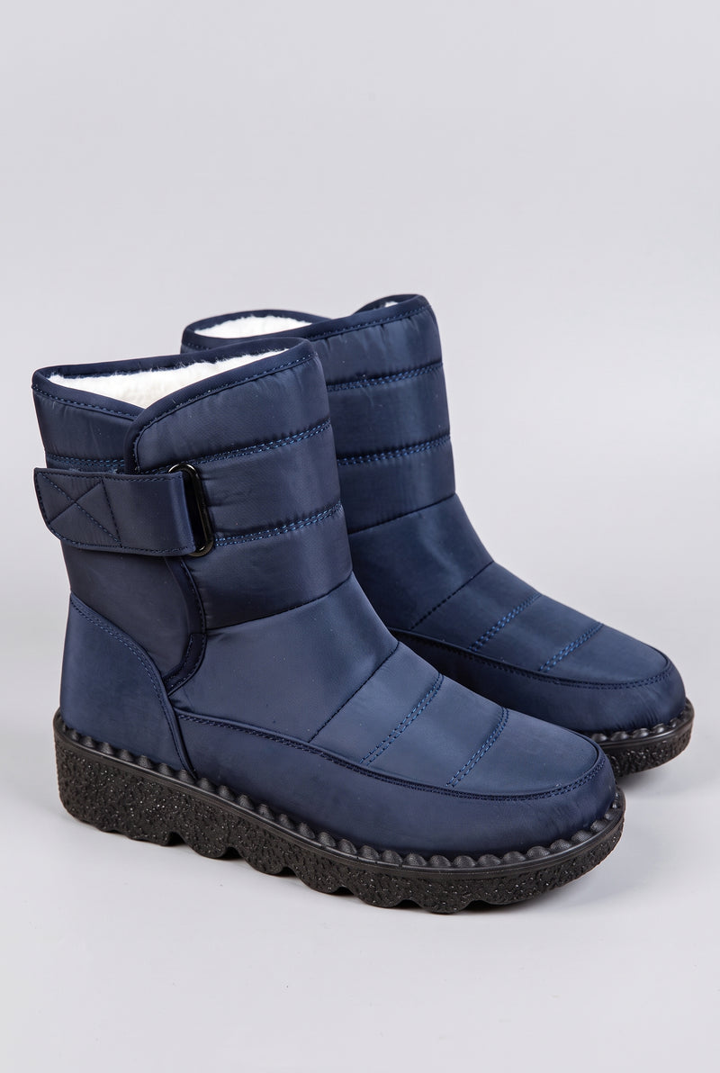 Quilted Ankle Snow Boots in Blue — studio front