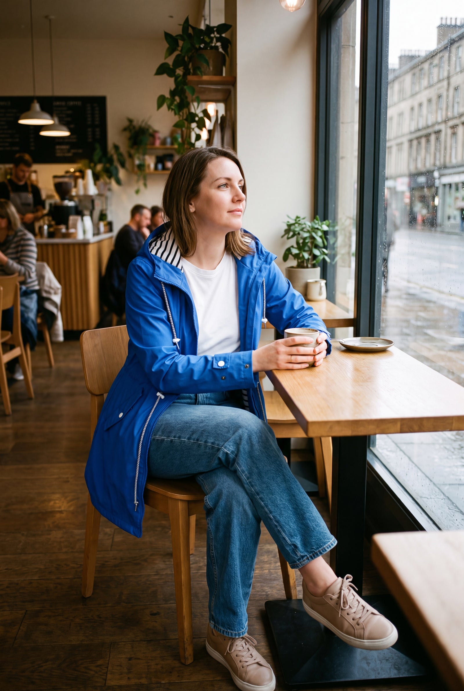 Women's Hooded Jacket Relaxed Fit in Blue — cafe window