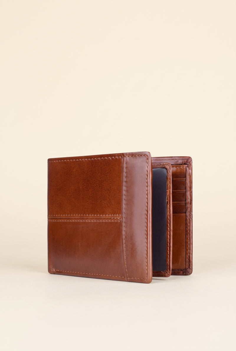 RFID-Blocking Leather Bifold Wallet in Brick Red — studio front