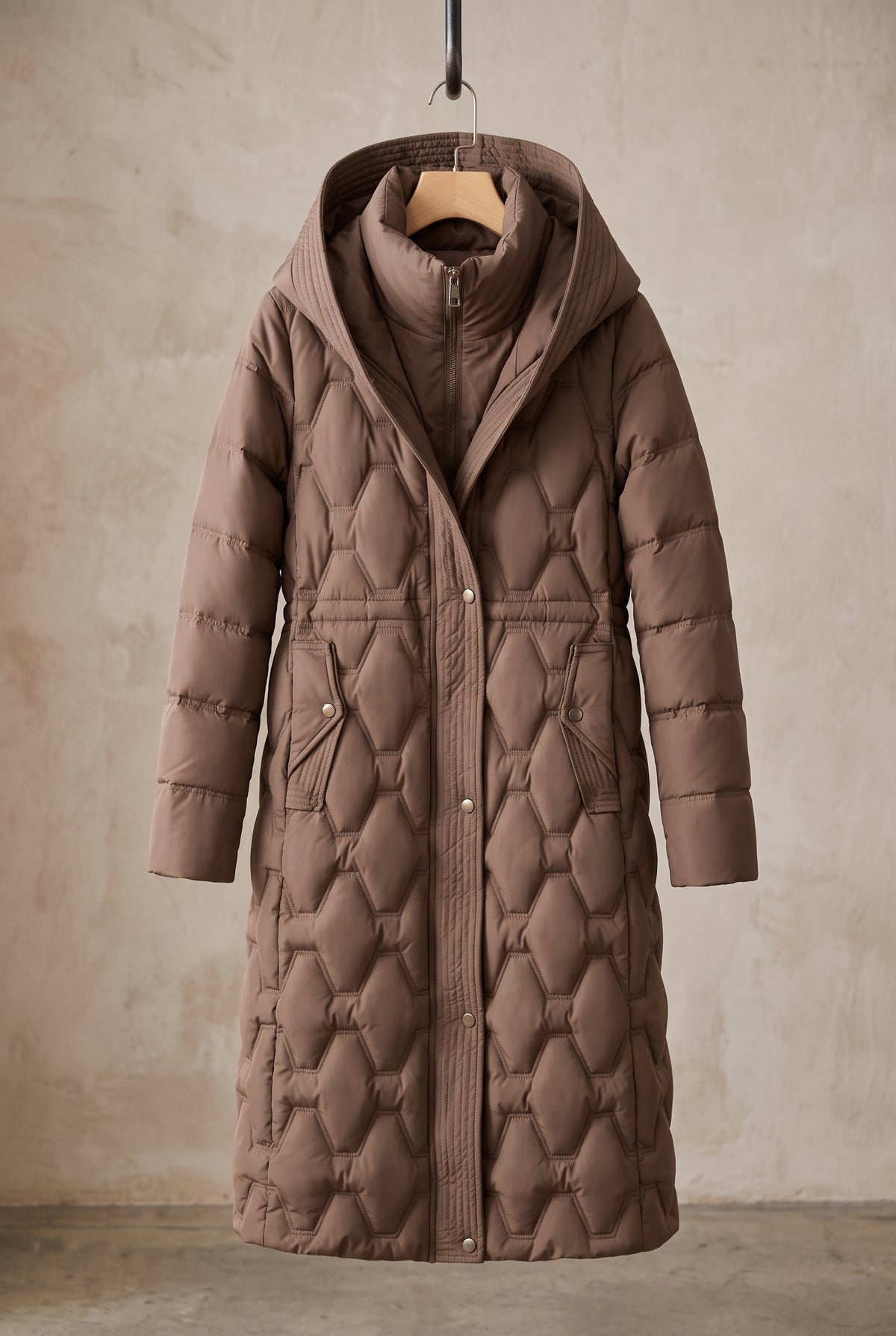 Longline Hooded Puffer Coat in Brown — studio front