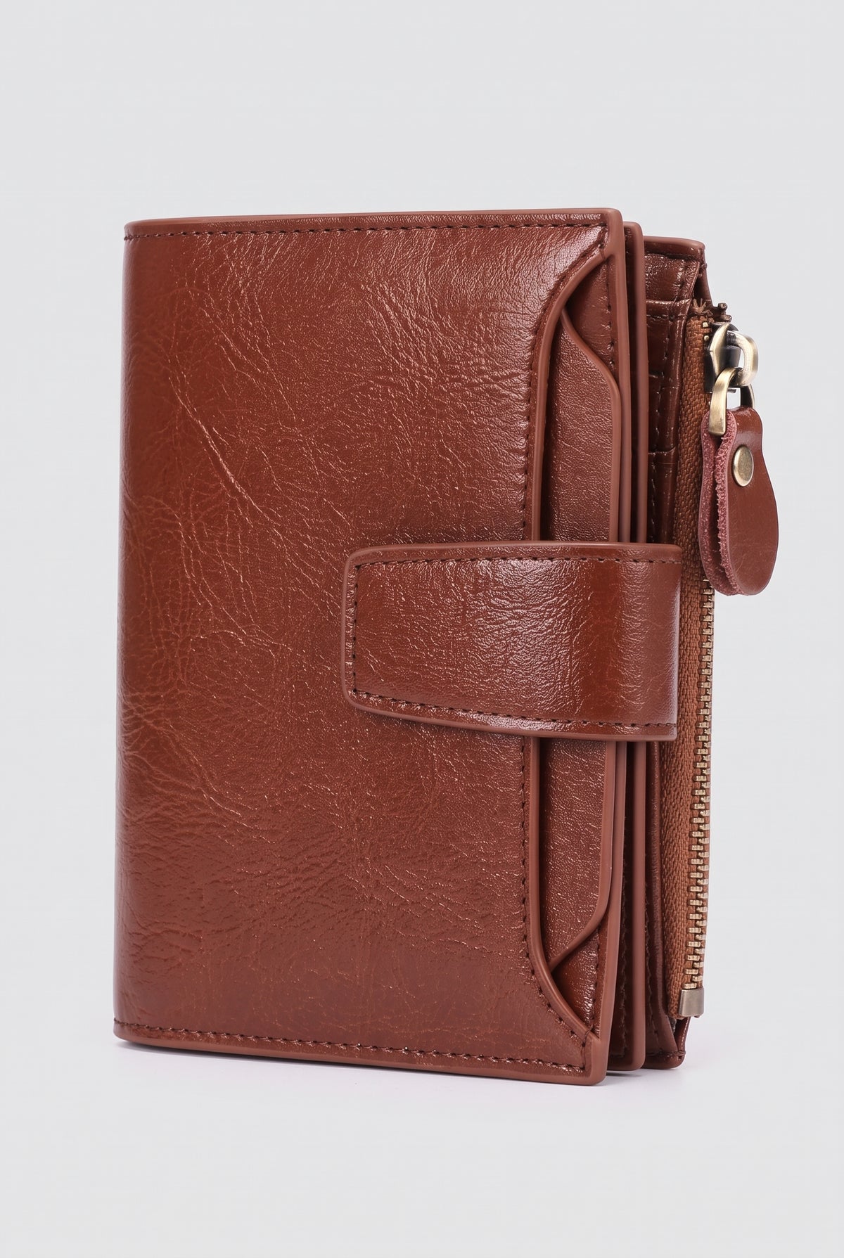 Pebbled Fold-Over Wallet in Brown — studio front