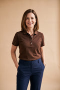Women's Polo Shirt Elegant Fit in Brown — studio full body