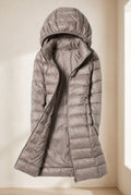 Glossy Hooded Puffer Coat in Campaign — studio front