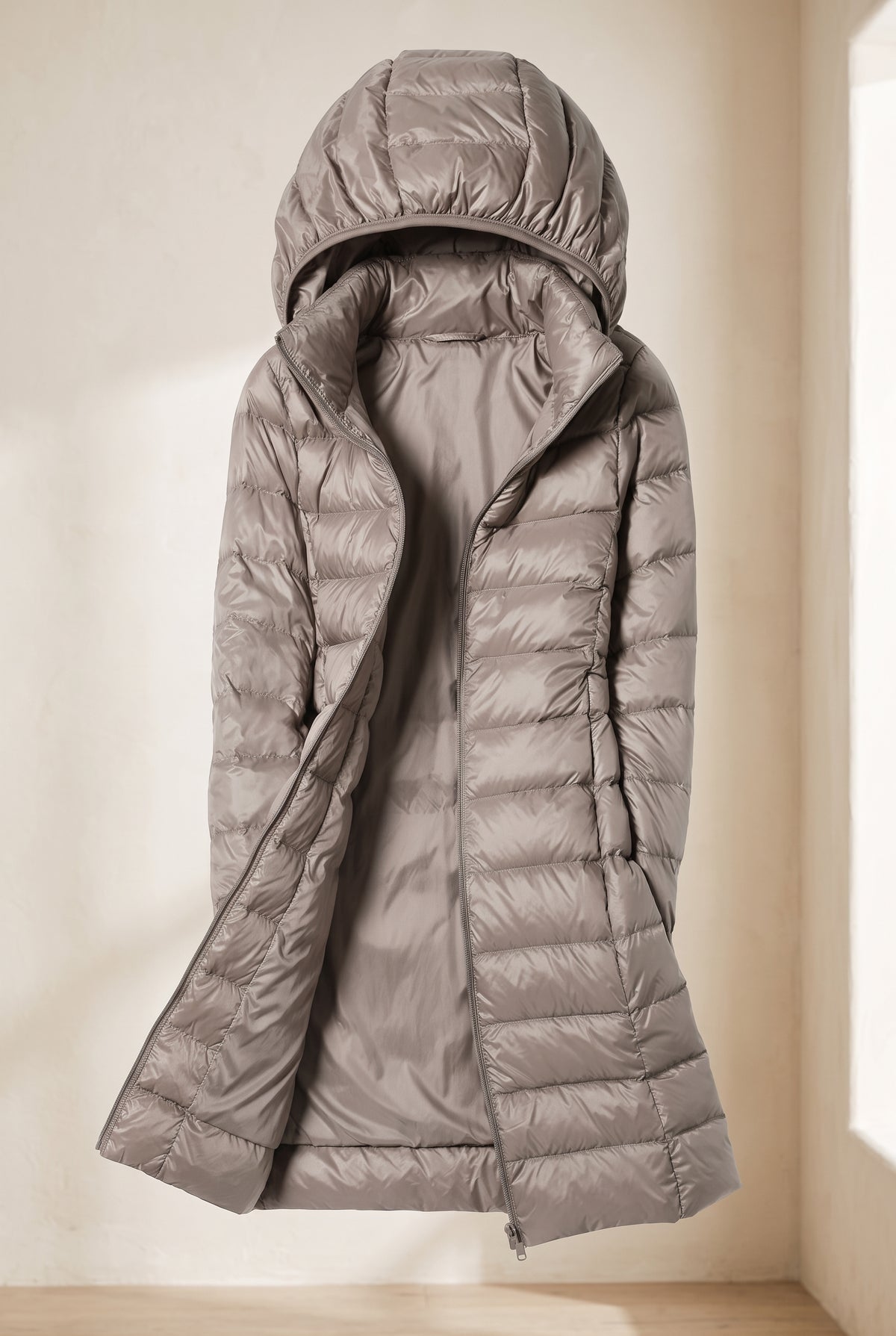 Glossy Hooded Puffer Coat in Campaign — studio front