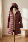 Glossy Hooded Puffer Coat in Chestnut Brown — studio front