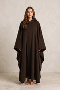 Hooded Cape with Wide Openings in Dark Brown — studio front