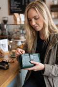 Pebbled Fold-Over Wallet in Dark Green — lifestyle