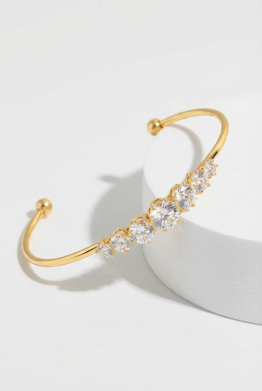 Gold Gold Open Bangle Bracelet with Graduated Diamond-style Stones - Bangles - Photo 1