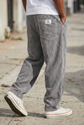 Corduroy Wide-Leg Pants in Gray — studio front