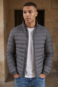 Quilted Puffer Jacket in Gray — studio front