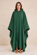 Hooded Cape with Wide Openings in Green — studio front