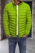 Quilted Puffer Jacket in Green — studio front