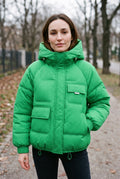 Quilted Hooded Puffer Jacket in Green — studio front