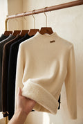 Ribbed High-Neck Sweater in Ivory — studio front