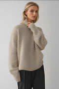 Oversized Ribbed Turtleneck Sweater in Khaki — front view