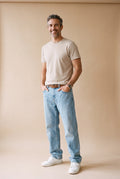 Men's Jeans Relaxed Fit in Light Blue — studio full body