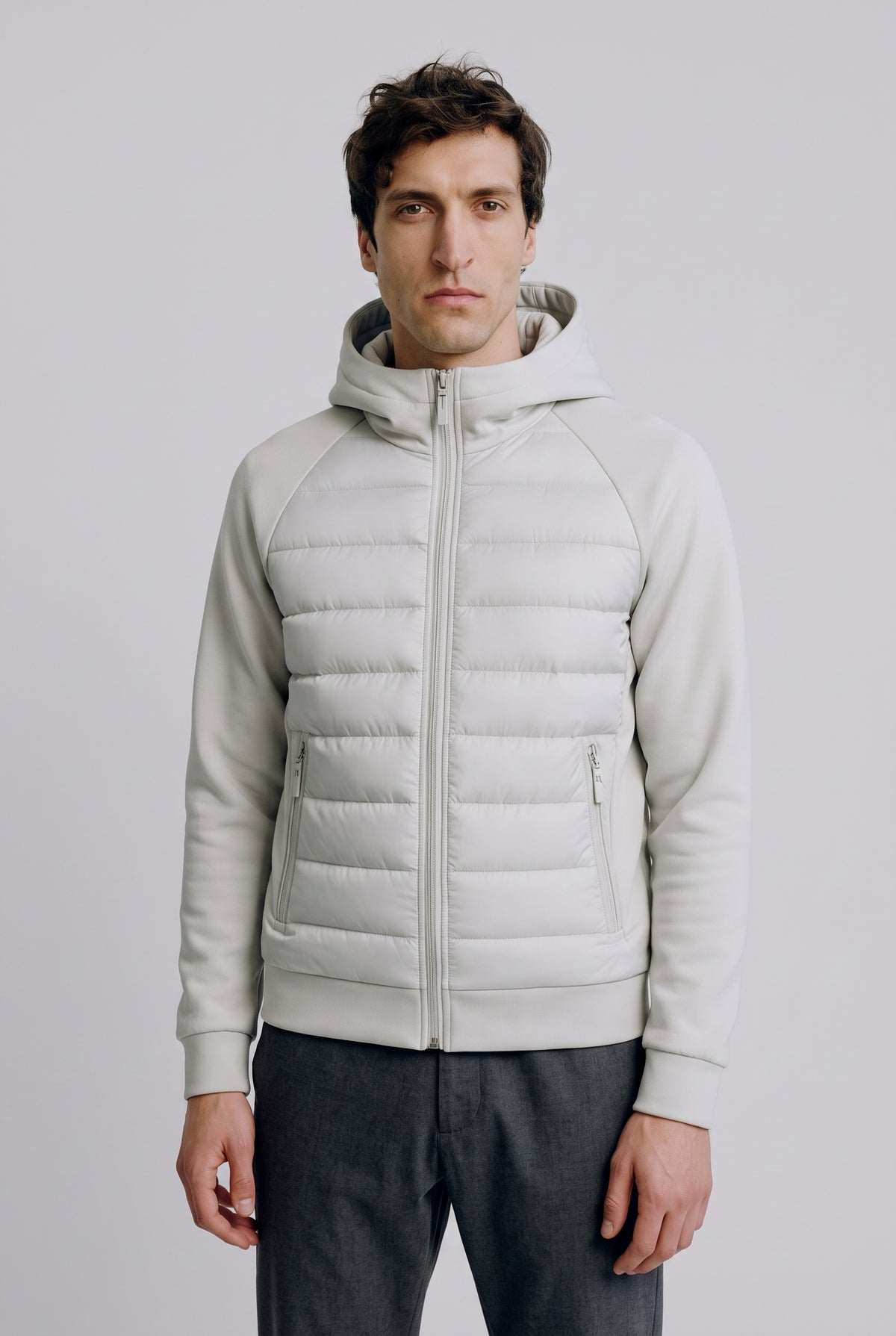 Hybrid Hooded Puffer Jacket in Light Grey — studio front