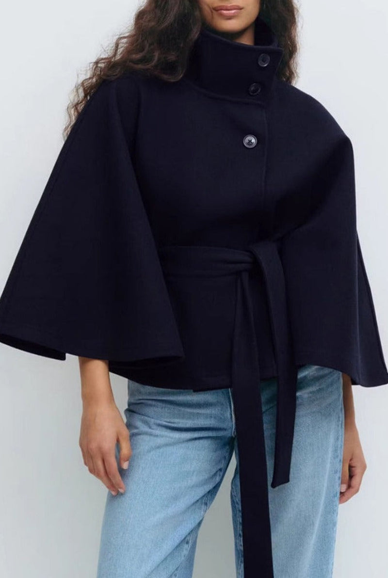 Belted High-Neck Cape Coat in Navy Blue — front view