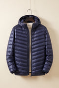 Insulated Quilted Down Jacket in Navy Blue — studio front