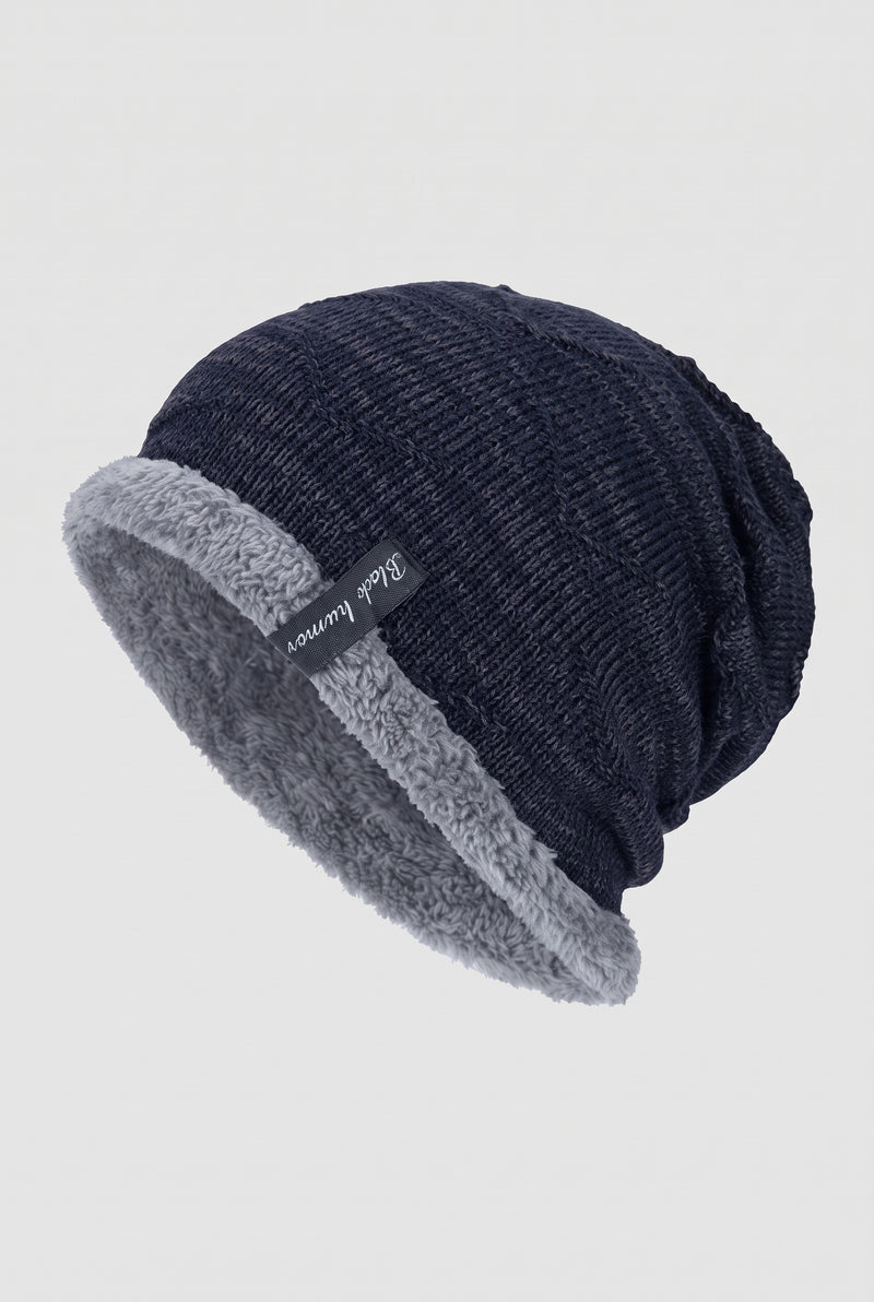 Plush-Lined Slouchy Beanie in Navy Blue — studio front