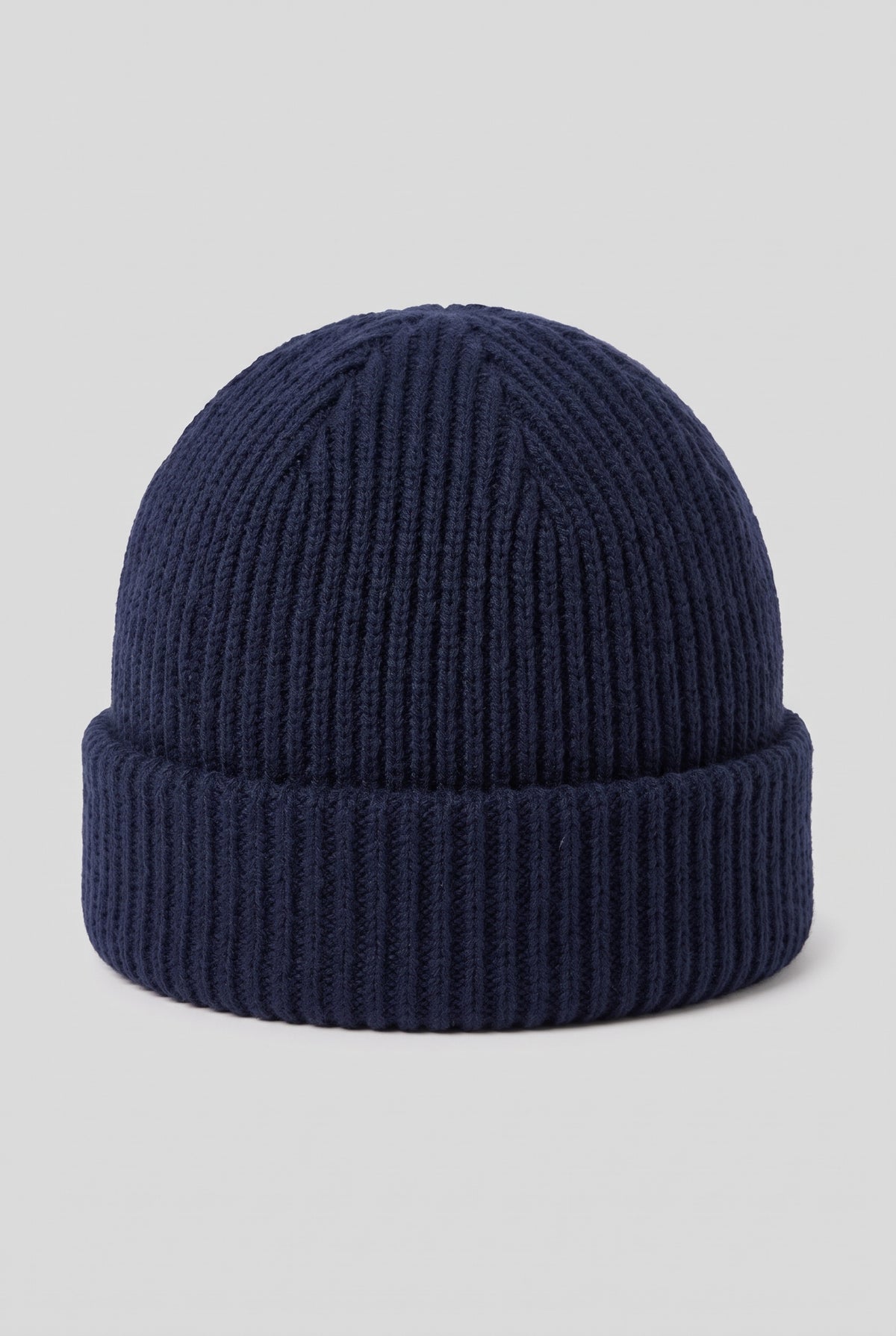 Ribbed Knit Dome Beanie in Navy Blue — studio front