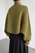Ribbed Knit Shrug in Olive — studio angle