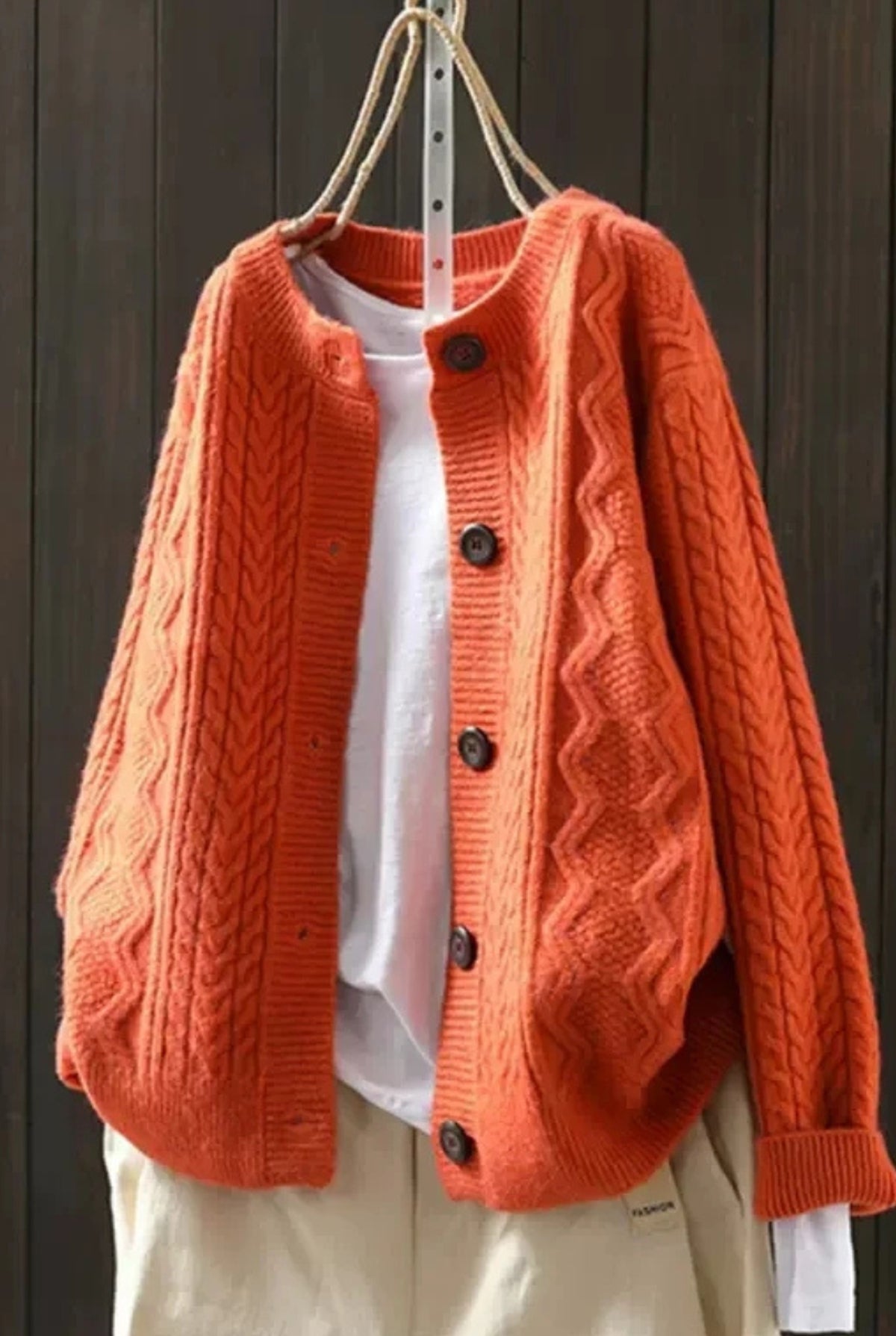 Cable-Knit Button Cardigan in Orange — front view
