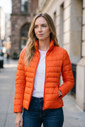Lightweight Quilted Puffer Jacket in Orange — studio front