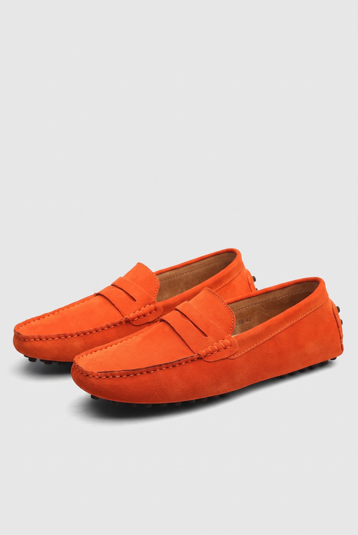Suede Moccasin Loafers in Orange — studio front