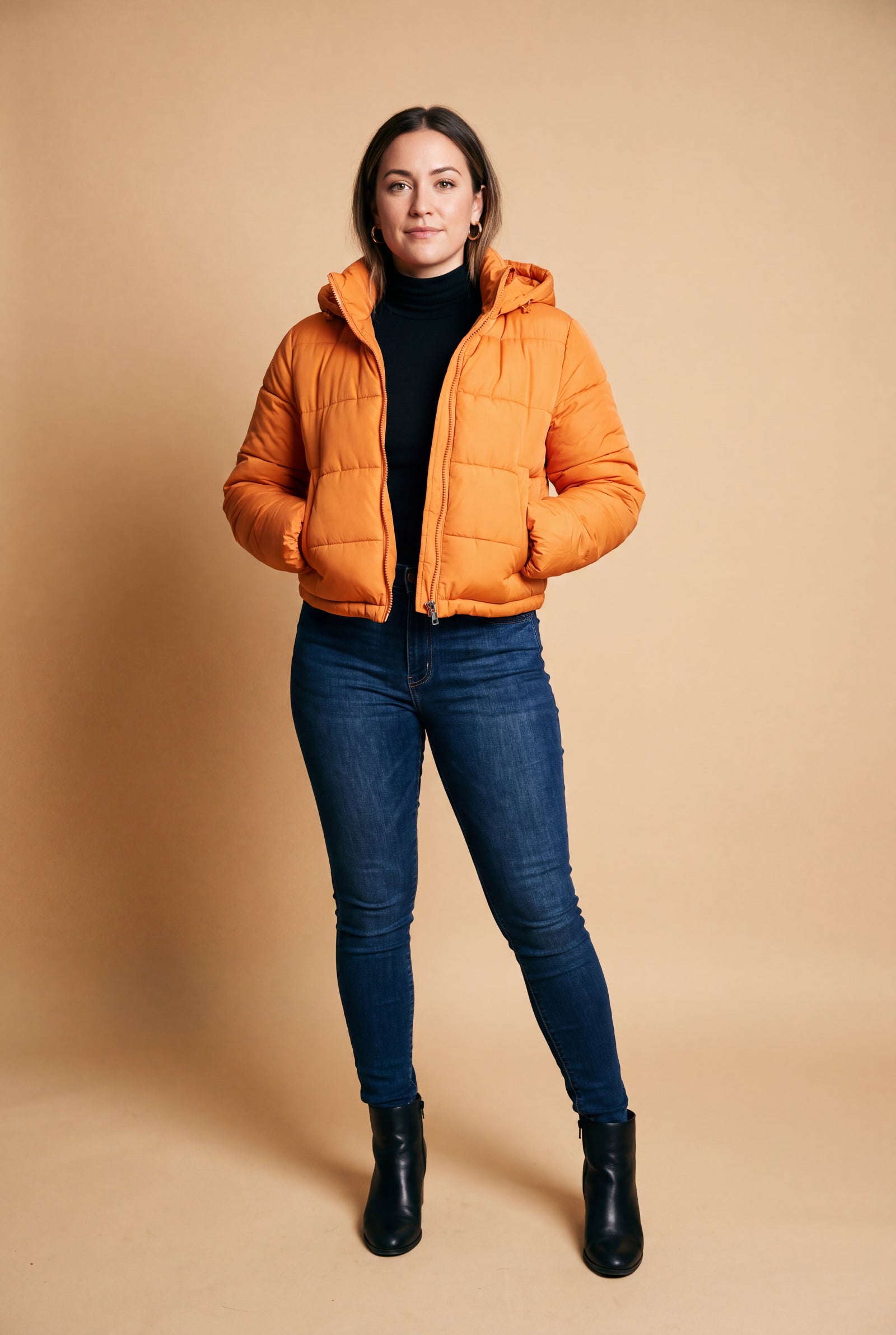 Women's Hooded Puffer Jacket Zipper in Orange — studio shot 1
