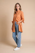 Women's Oversized Button-Up Shirt in Orange — studio full body