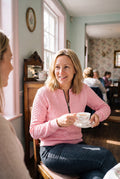 Women's Jumper Half-Zip Fitted Cable Knit in Pink — lifestyle cosy tea room