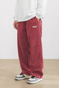Corduroy Trousers with Drawstring in Red — studio front