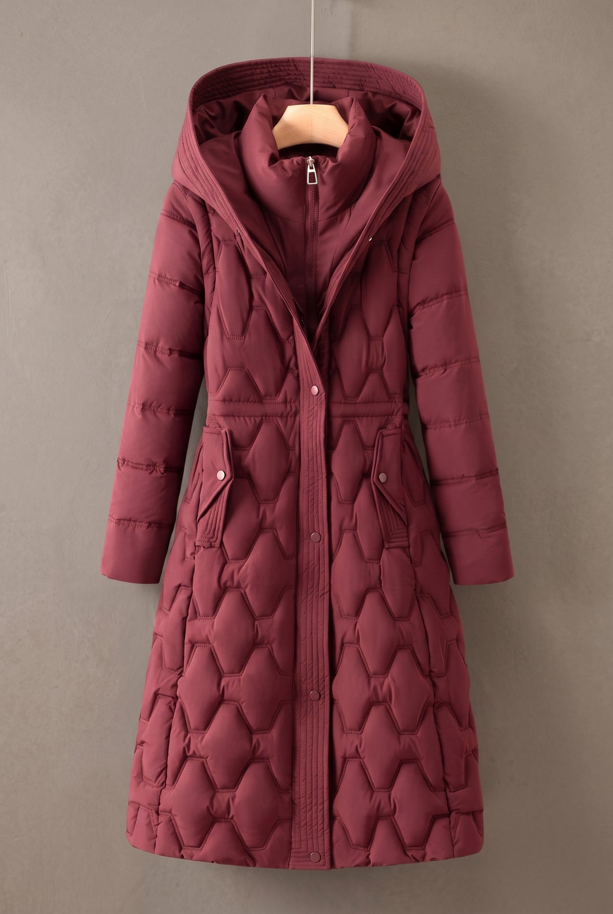 Longline Hooded Puffer Coat in Red — studio front