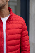 Quilted Puffer Jacket in Red — studio detail